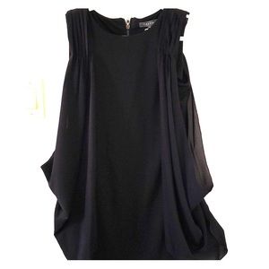 Mini Garcia Black Dress starched with a side cape
